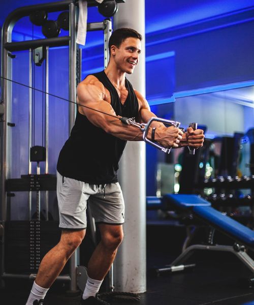 Man feeling energetic and powerful after exercise